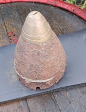 Trench art paperweight, metal