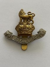 THE ROYAL DRAGOONS CAP BADGE.