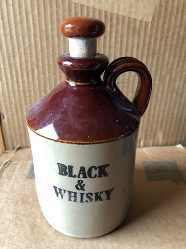 Black and whiskey jug flagon - and,