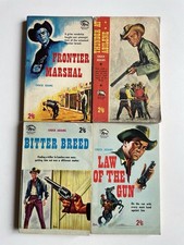 Chuck Adams 4 paperback books western fiction bundle.