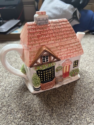 The village teapot collection - village,