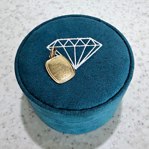 Yellow gold tone rectangle