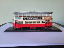 A STATIC MODEL OF A LONDON UNITED TRAM ON RAILS/BASE: 8.25" LONG: VG CONDITION