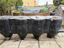 large koi pond filter, 10ft long and 4.5ft high approx, black in colour.