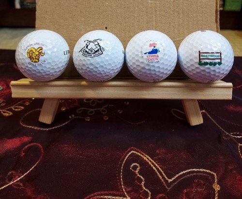 Four logo golf balls - logo,