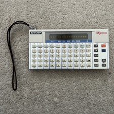 Sharp IQ-3000 Electronic Translator Calculator Vintage 1980s