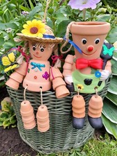 PAIR BILL & BEN TERRACOTTA