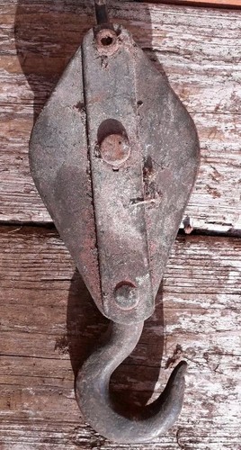 Vintage metal pulley with - with, hook