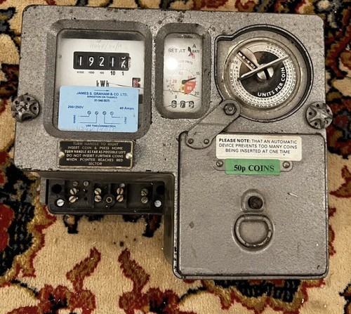 Coin operated electric meter - ,