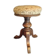 An Antique Victorian Walnut Upholstered Swivel Adjustable Piano Stool