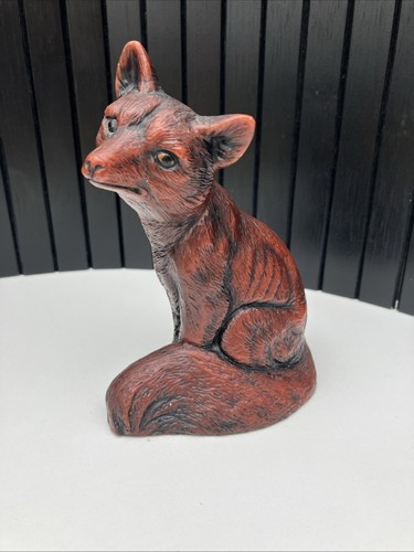 Deep red carved resin sitting - red,
