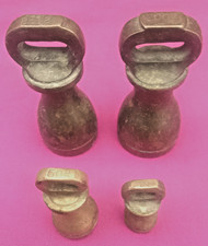 A collection of  4 different Metric upright weights.  FREE POST
