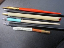 A collection of  dip pens / pencil