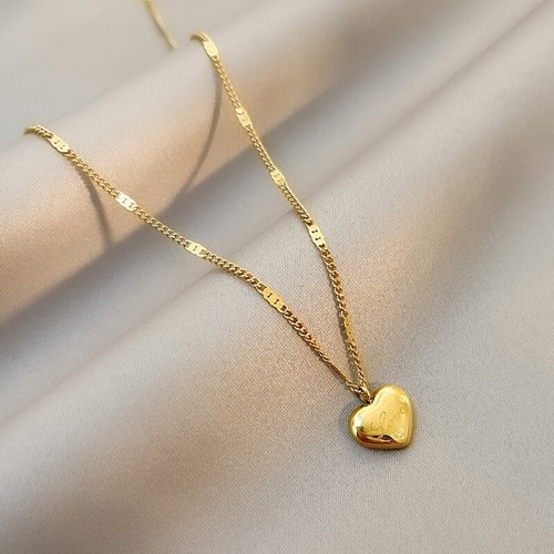 Gold tone heart pendant - gold,