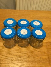 6 Glass Used Preserve/condiment Jars capacity 170ml  approx with blue Lids