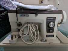 Vintage Original 'New Home' Sewing Machine, with foot pedal, manual and tools