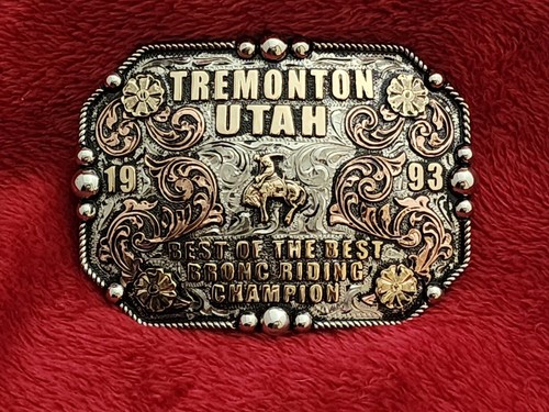 Champion bronc riding - bronc, trophy