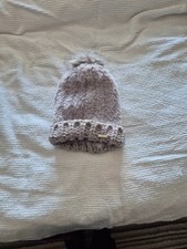 women's wooly hat with pompom