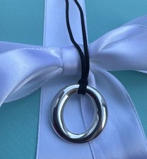 Tiffany & Co Elsa Peretti Silver Sevillana pendant on original 16” Silk Cord 