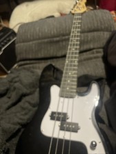 Bass Guitar With The Case And