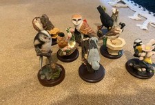 Collection of 8 bird ornaments