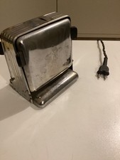 ANTIQUE TOASTER. DECORATIVE