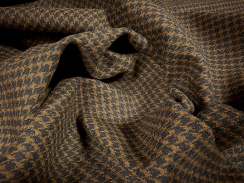 Plastic backed wool tweed - plastic,