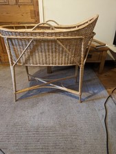 Vintage wicker baby cradle on stand with Laura Asley lining