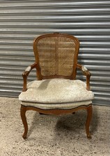 Antique French Louis XV Style Carved Cane Back Armchair with Padded Seat