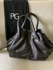 Purificacion Garcia Dark Brown