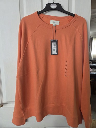 And orange jumper size 2xl - and,