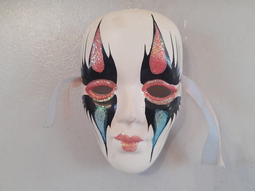 Wall hanging face mask - wall, hand