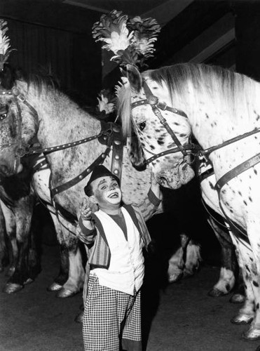 Clown with horses the - with,