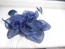 ladies very deep mauve clip in fascinator