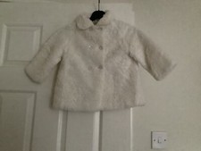 Little girls white furry coat size 90 cms Age 1-2 years. reasonable condition
