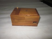 wooden cigarette box with push button for tray opening old used brown retro