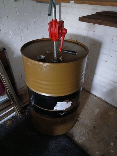 Empty oil drum and - oil,