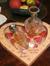 A PAIR OF 1989 RALPH LAUREN SAFARI PERFUME BOTTLES ( DISCONTINUED )