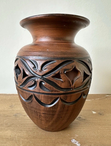 Hand made terracotta vase - hand,