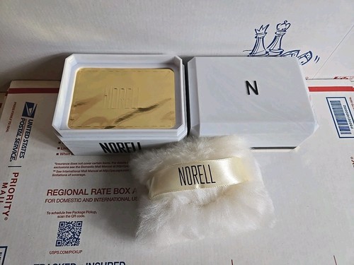 Norell vintage perfume dusting - norell,