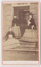 Dog CDV-three well to do ladies, one holding a dog, outside their country house