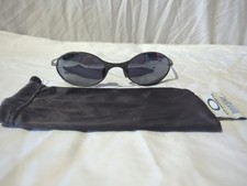 Vintage 90’s RARE Oakley E Wire Titanium Sunglasses Chrome Silver Color Matrix