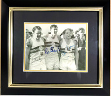 Roger Bannister, Chris Chataway and Chris Brasher signed photo.