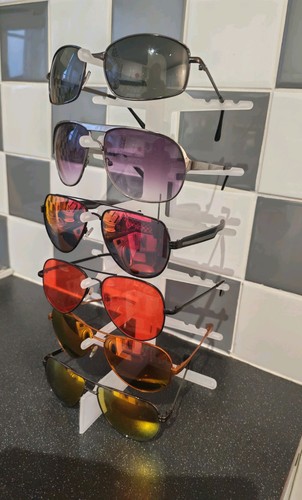 White sunglasses stand - sunglasses,