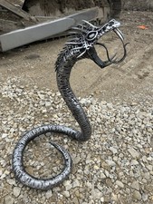 Steel serpent sculpture