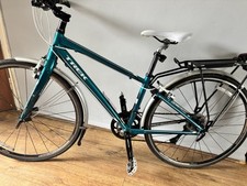 Trek 7.5 FX WSD Hybrid Bike + Premium Rains Poncho 