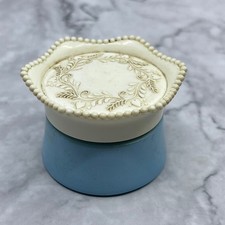 Off White and Blue Avon Cream