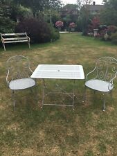   French antiques ornate metal folding cafe table and 2  French cafe arm chairs