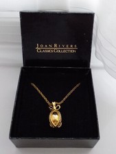 Beautiful Joan Rivers Gold Plated Faberge Inspired Bow Egg Pendant Necklace