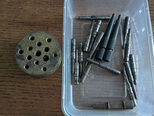 Clockmaker punches and anvil - and,
